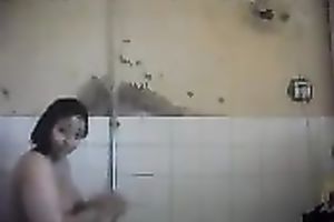 Arab milf takes shower caressing her hot breasty body on camera