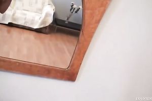 Hypnotizing dark brown young sweetheart filming herself bare in the mirror