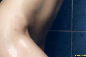 Flexible and sexy dark brown legal age teenager widens her legs in the air