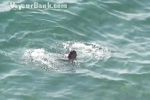 Sweet girlfriend and her guy were sunbathing nude on the beach