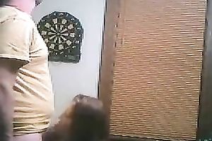 Sexy all natural black haired playgirl stood on knees to engulf a yummy wang