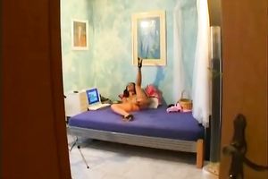 Svelte nylon loving euro brunette masturbating on the ottoman