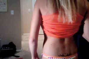 Beautiful sassy golden-haired legal age teenager shows of her wobblers on web camera