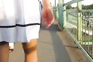 Following hawt slim hottie in short petticoat trying to watch her snatch