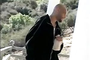 Sensational chocolate bimbo in pink bikini gives orall-service