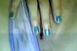 Brunette cam whore in T-shirt was busy with a delicate masturbation of her vagina