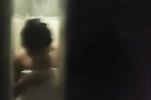 Spy livecam clip of quite skinny brunette taking a shower and drying herself