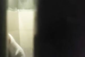 Spy livecam clip of quite skinny brunette taking a shower and drying herself