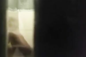 Spy livecam clip of quite skinny brunette taking a shower and drying herself