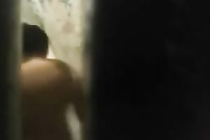 Spy livecam clip of quite skinny brunette taking a shower and drying herself