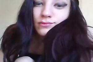 Mesmerizing dark brown legal age teenager beauty on web camera flashing bra buddies