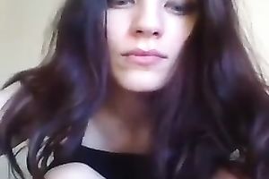 Mesmerizing dark brown legal age teenager beauty on web camera flashing bra buddies