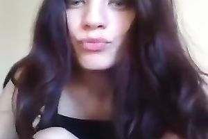 Mesmerizing dark brown legal age teenager beauty on web camera flashing bra buddies