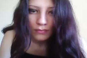 Mesmerizing dark brown legal age teenager beauty on web camera flashing bra buddies