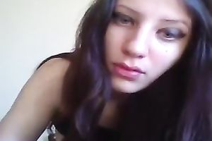 Mesmerizing dark brown legal age teenager beauty on web camera flashing bra buddies