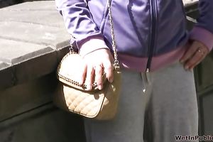 Busty Russian honey in yoga pants has pissing fetish