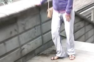 Busty Russian honey in yoga pants has pissing fetish