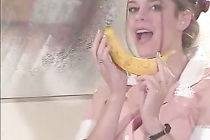 Horny waitress takes her uniform off and plays with a banana