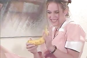 Horny waitress takes her uniform off and plays with a banana