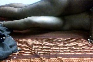 Dark skinned non-professional Hindu pair copulates in missionary position