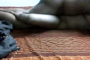 Dark skinned non-professional Hindu pair copulates in missionary position