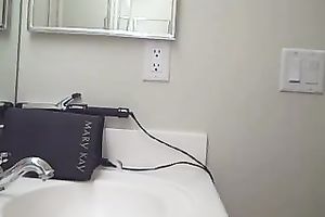 My charming nerdy girlie disrobes to masturbate her twat a bit