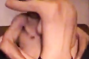 Red haired chick riding solid rod in a cowgirl position