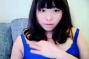 Cute dilettante dark brown Asian model girl on cam teases me with her tits