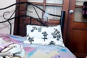 Fabulous white girl topless playing with a toy on livecam