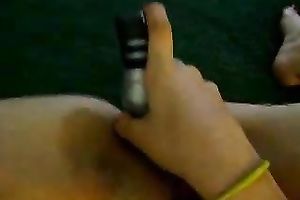 Selfie of my cute college girlfriend diddling her twat with sex-toy