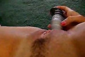 Selfie of my cute college girlfriend diddling her twat with sex-toy