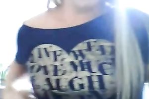 Pretty light haired girlie works on livecam and flashes her large boobies