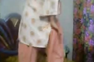 That my overweight Pakistani girlfriend putting on her clothing