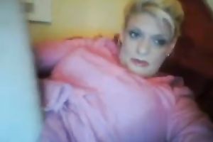 I am a excited cougar and I stuff my moist love tunnel with a sex toy