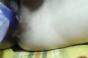 Horny paramour toying her pussy with large sex toy