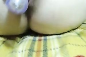 Horny paramour toying her pussy with large sex toy