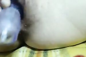 Horny paramour toying her pussy with large sex toy