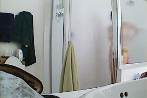 Appetizing breasty hottie taking a shower hidden webcam sex clip