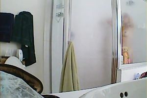 Appetizing breasty hottie taking a shower hidden webcam sex clip