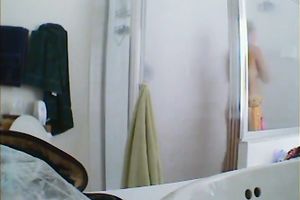 Appetizing breasty hottie taking a shower hidden webcam sex clip