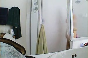 Appetizing breasty hottie taking a shower hidden webcam sex clip