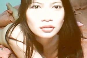 Beautiful and juvenile Asian bimbo masturbates on cam