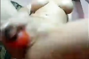 Curvaceous Colombian dark brown undresses on cam and masturbates