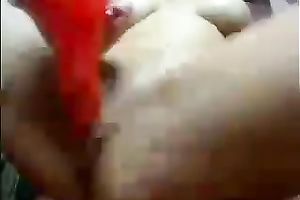 Curvaceous Colombian dark brown undresses on cam and masturbates