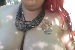 Red haired big beautiful woman in dark fishnet nylons was teasing her own cunt