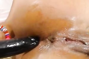 Poking my oiled up love tunnel with large dark sex tool in homemade video