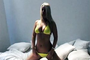 My well shaped white bitch brags off her amazing body in yellow bikini