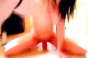 Spoiled legal age teenager with flat scones riding giant sex toy on a floor