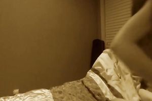 Sassy and bosomy young brunette shows her breasts and cunt