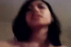 Cute and hot Indonesian wife riding my ramrod in a cowgirl position